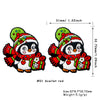 Scarlet red silicone bead shaped like a penguin with festive Christmas decorations