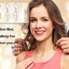 A woman models gold and silver filled magnetic jewelry clasps for necklaces on her neck.