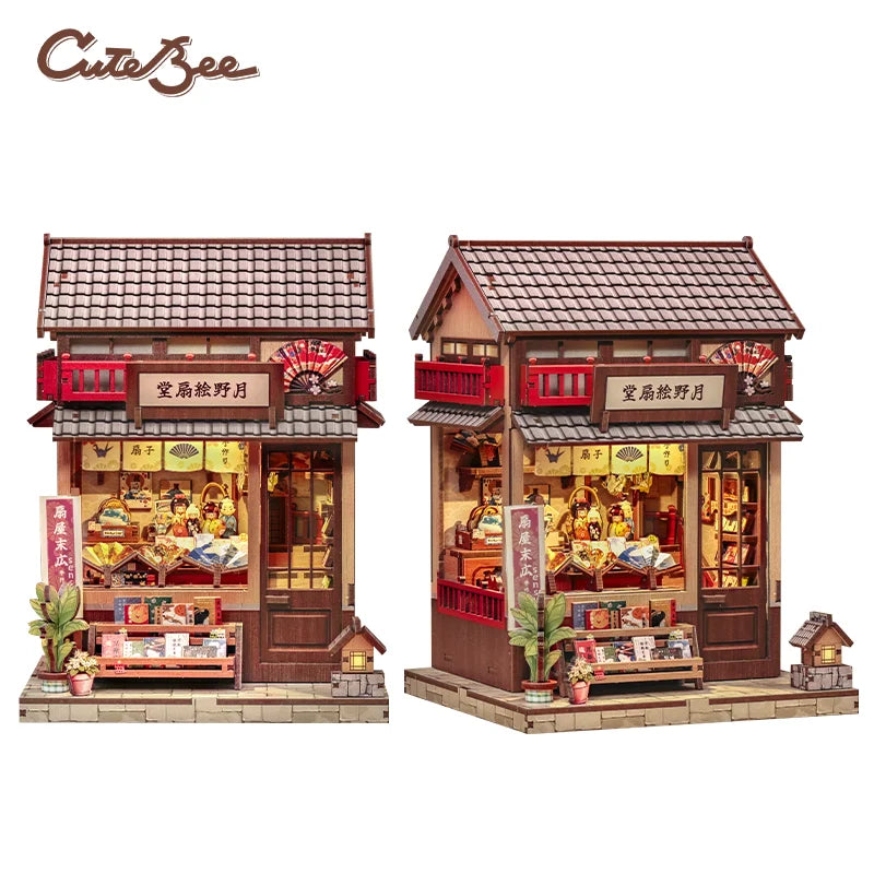 A detailed 3D wooden book nook kit featuring a traditional Japanese-style shop facade with LED lighting.
