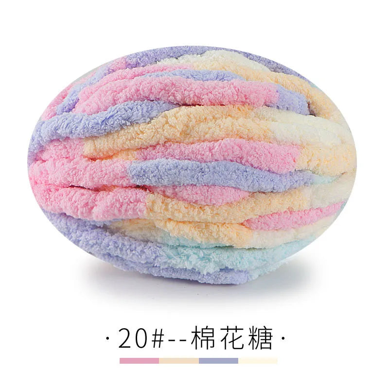 A ball of chunky chenille yarn in pastel colors including pink, purple, and blue.