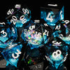 A close-up view of a set of translucent blue liquid core dice used for tabletop gaming.