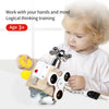 A toddler is playing with a wooden busy cube toy that features a faucet and a lock, designed for logical thinking training.
