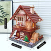 A detailed wooden cuckoo clock puzzle kit featuring a house structure and a cuckoo bird, displayed on a base.