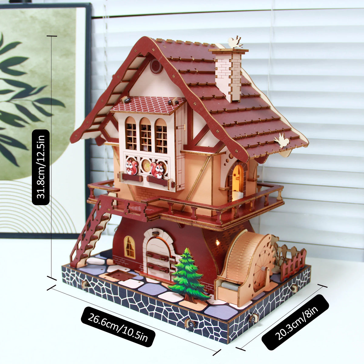 A detailed wooden cuckoo clock puzzle kit featuring a house structure and a cuckoo bird, displayed on a base.