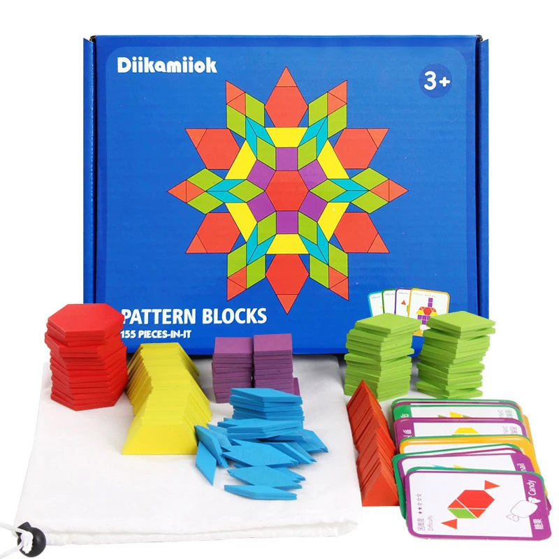 A box of 155-piece wooden pattern blocks with colorful geometric designs and design cards displayed on a white cloth.