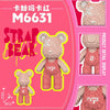 A pink and beige micro building block set shaped like a bear, featuring a red and pink color scheme.