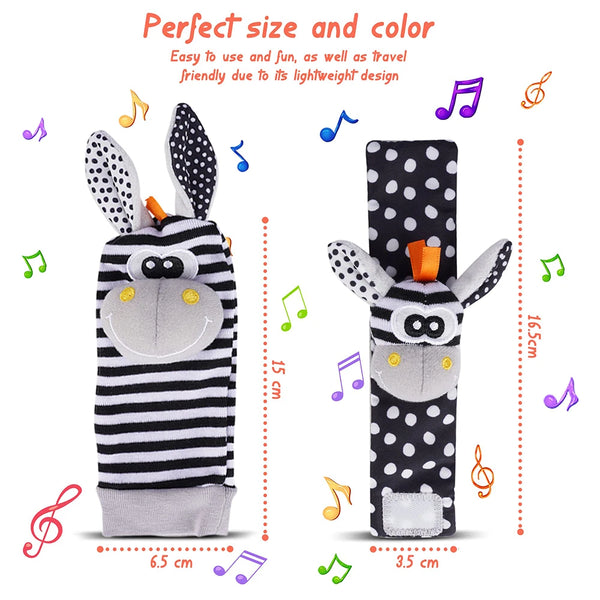 A black and white striped stuffed animal rattle toy with large ears and a soft face, shown next to its size measurements.