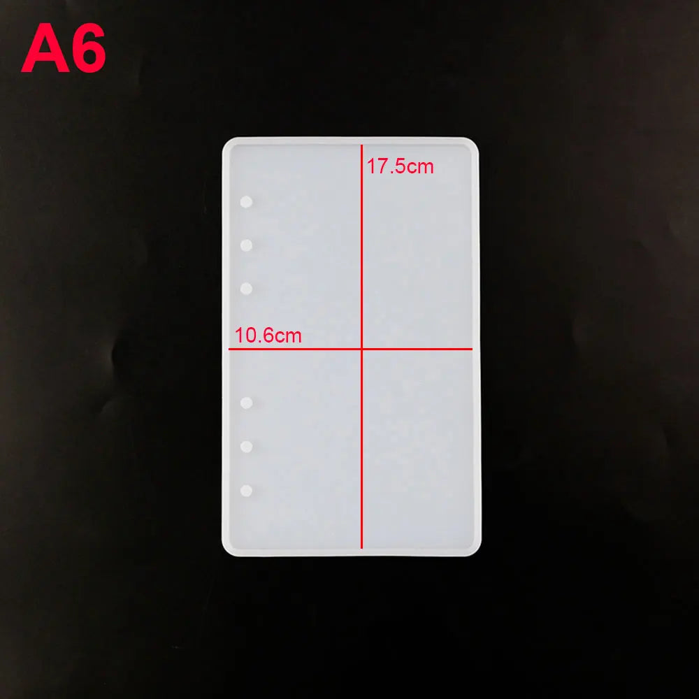 A white silicone mold for an epoxy resin notebook cover, showing dimensions of 17.5cm and 10.6cm.