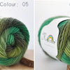 A ball of bright green merino wool yarn, color 05, shown in a close-up view.
