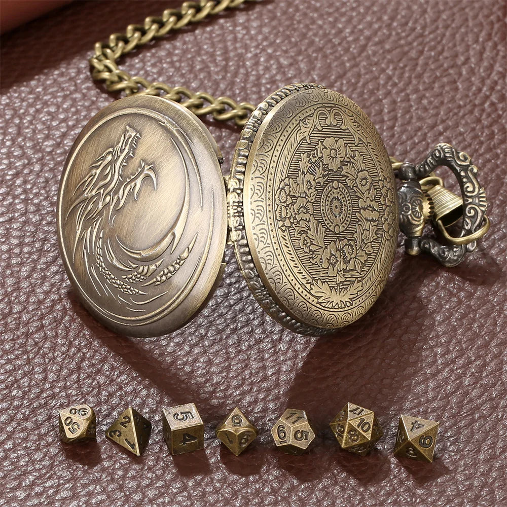 A brass steampunk dragon pocket watch dice case with seven small dice resting on a brown leather surface.