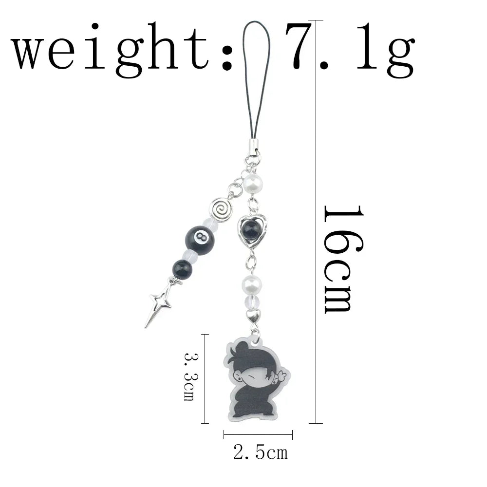 A silver anime-inspired keychain featuring a charm and a hanging loop.