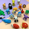 A collection of colorful, cute 3D puzzle animal erasers for kids, including yellow, black, orange, and blue figures.