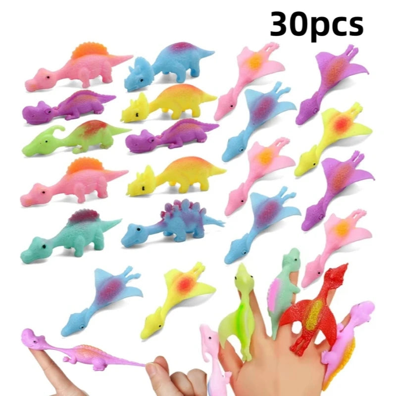 A collection of 30 colorful rubber dinosaur slingshot toys held in a hand.
