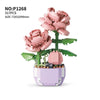 Pink floral bouquet building block set with green stems and purple base
