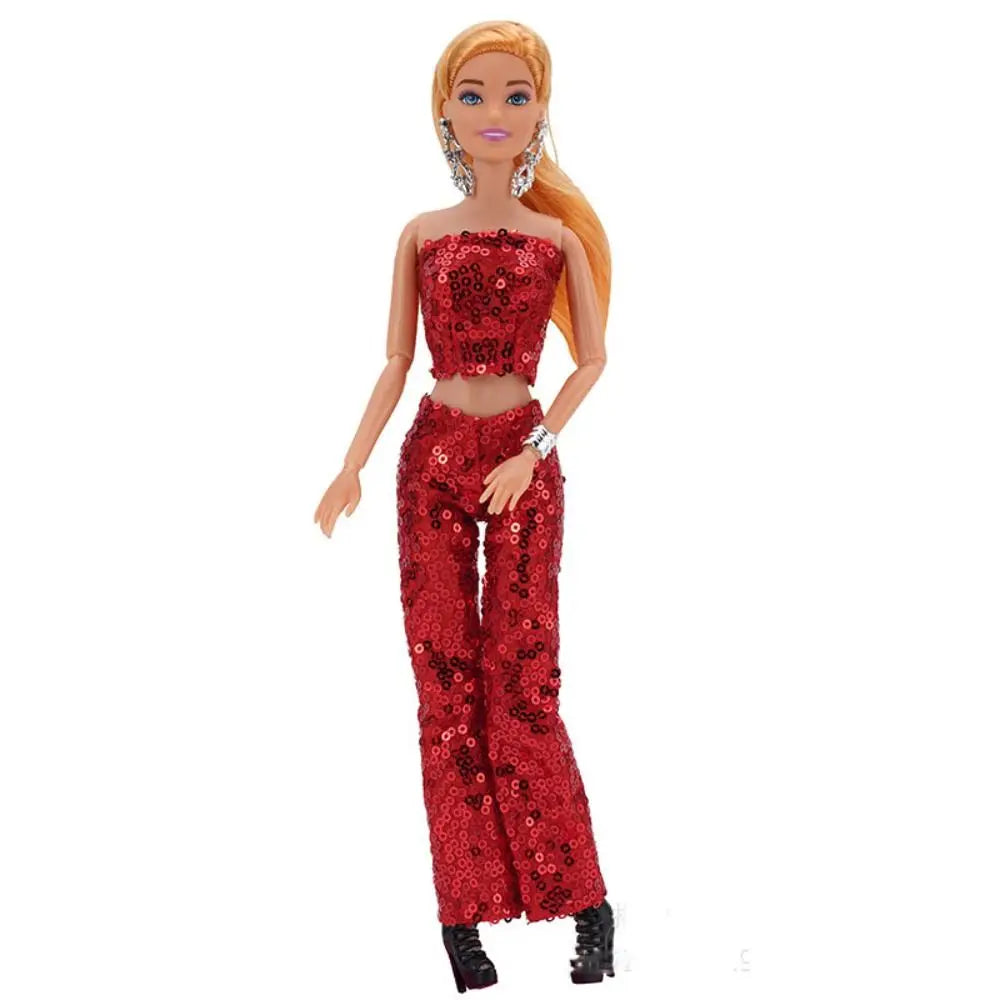 A fashion doll wearing a red sequin top and matching red sequin trousers set