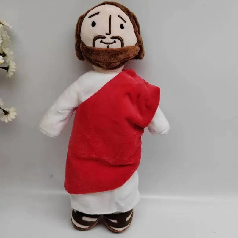 Poupée de simulation à la barbe d'un homme vêtu d'une cape rouge et d'une tunique blanche.