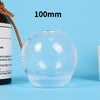 A clear silicone sphere mold, 100mm in diameter, is shown on a light blue background.