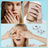 Close-up of hands wearing and adjusting an adjustable cat-ear crochet ring for jewelry