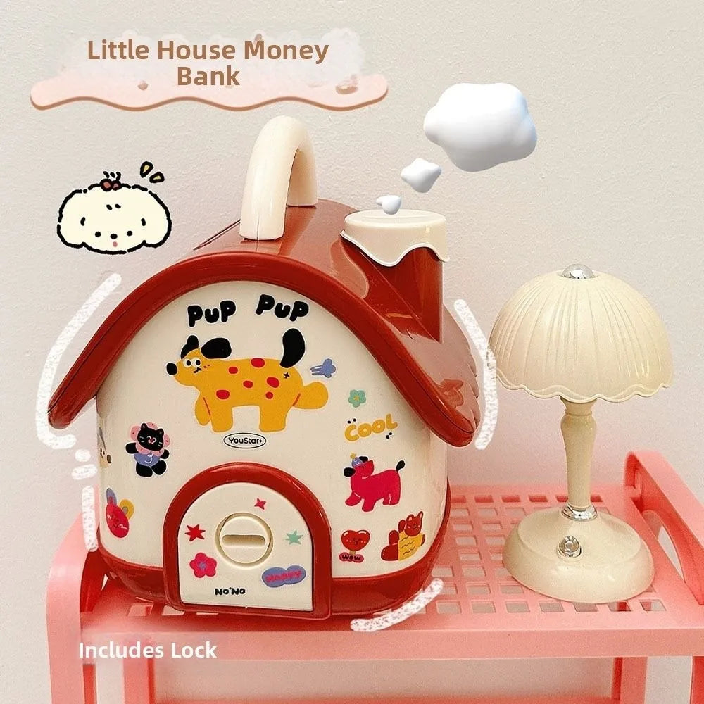 A red house-shaped piggy bank with a lock and key is shown on a pink shelf.