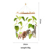 Wooden felt forest animal crib mobile featuring various animals and leaves suspended from a wooden frame