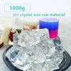 A pile of clear ice crystals and various colored wax samples are displayed for DIY crystal wax raw material.