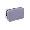 A navy blue and white striped canvas pencil case with a zipper and a small charm.