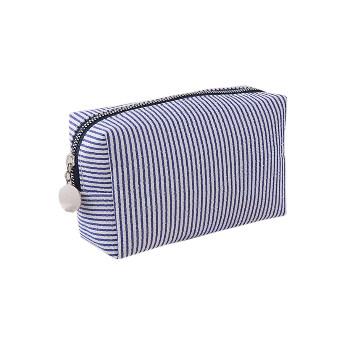 A navy blue and white striped canvas pencil case with a zipper and a small charm.