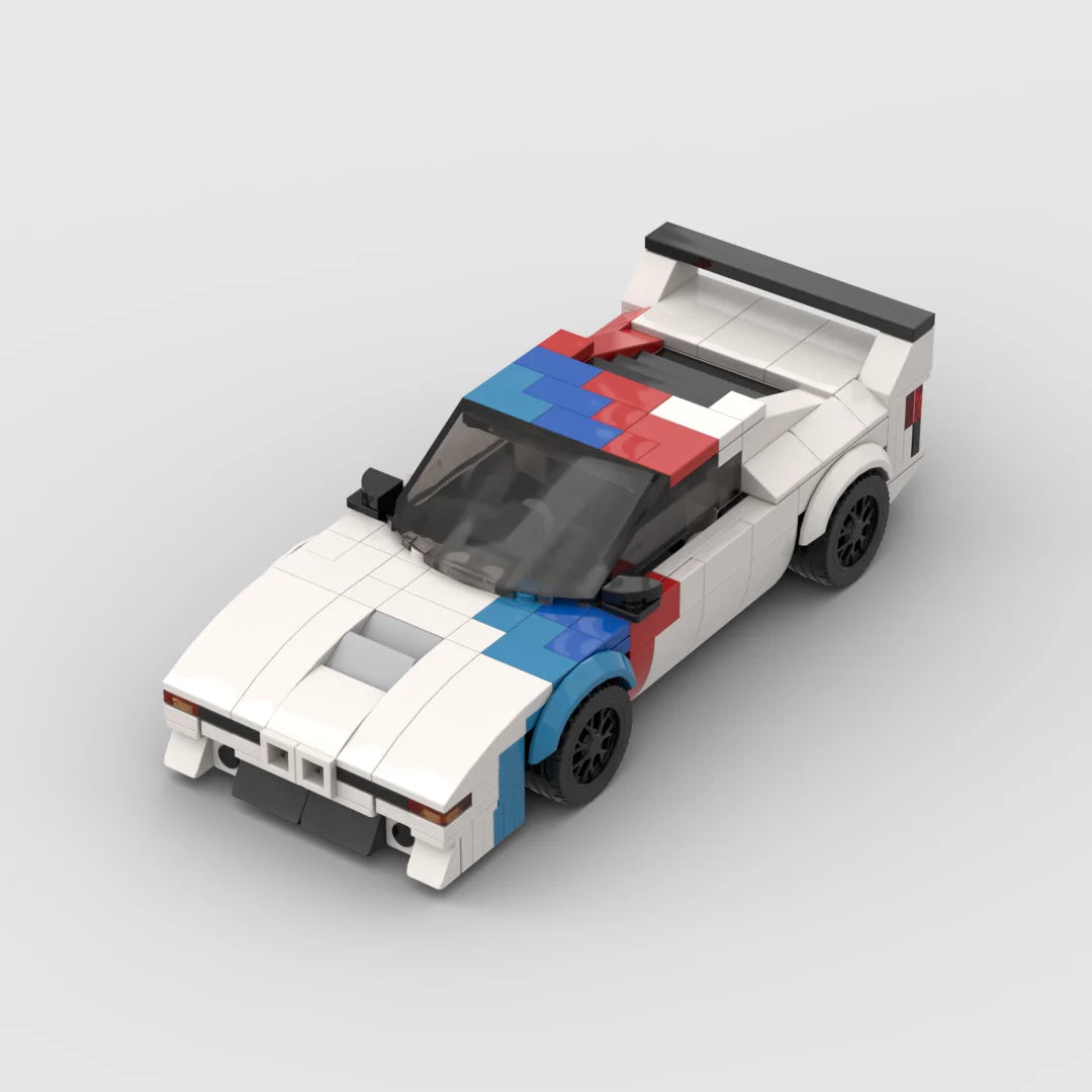 A white and red classic supercar model built from building blocks, shown in a side view.