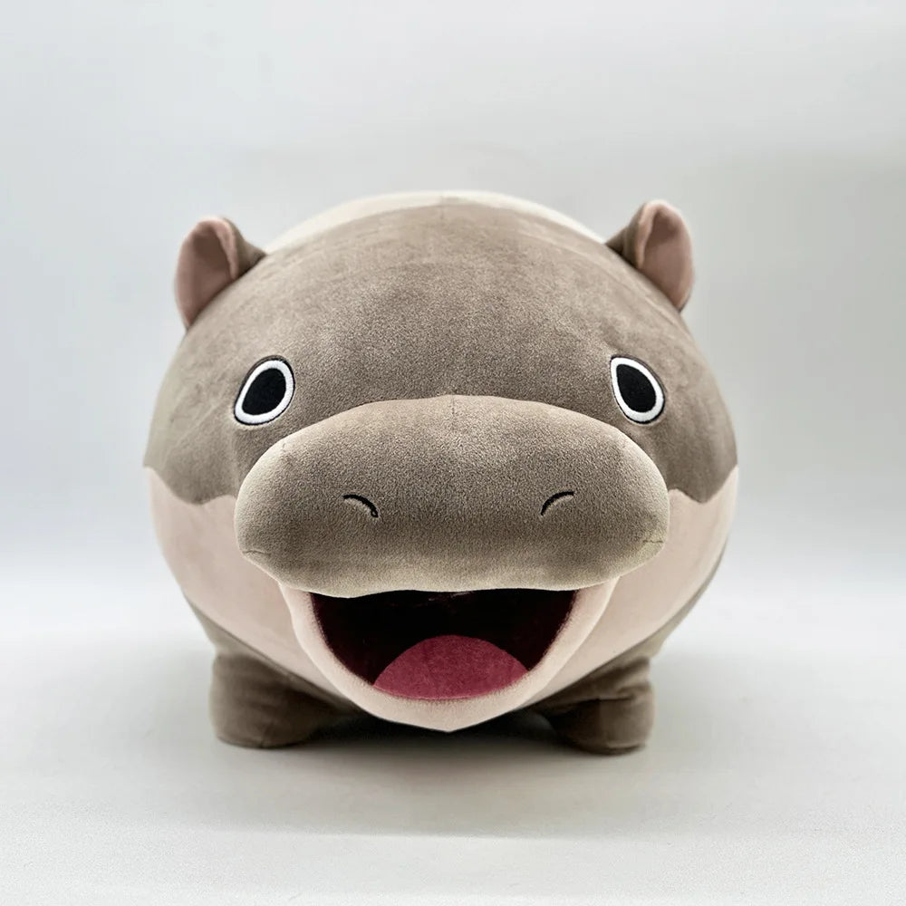 A light gray Moo Deng Pygmy Hippo plush toy with large eyes and an open mouth.