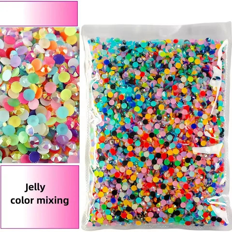 Bag of AB-Coated flat back resin rhinestones in various bright colors for crafts and DIY projects
