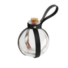 A clear glass potion bottle with a cork stopper and a black leather strap, suitable for cosplay.