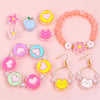 A collection of colorful enamel charm beads and gold-plated earrings for DIY jewelry making.