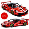A detailed red hypercar building block model kit with black accents and yellow wheels.