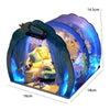 A glowing blue acrylic dollhouse kit depicting a seaside villa interior with furniture.