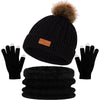 Black knit winter hat, scarf, and gloves set with a faux fur pom