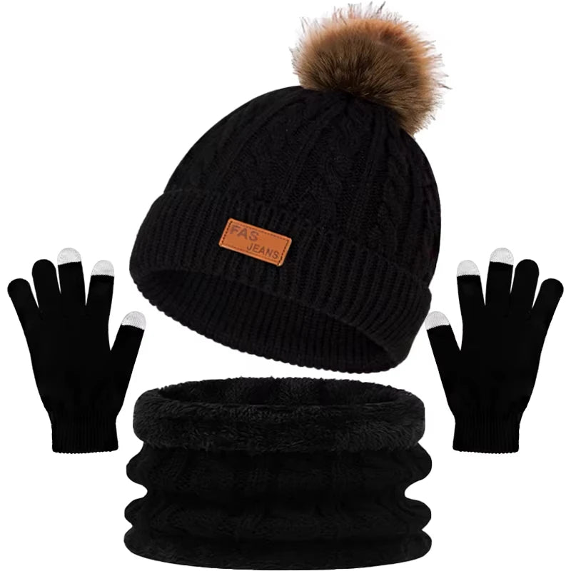 Black knit winter hat, scarf, and gloves set with a faux fur pom