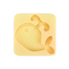 A yellow silicone mold shaped like a fish used for DIY craft kits.