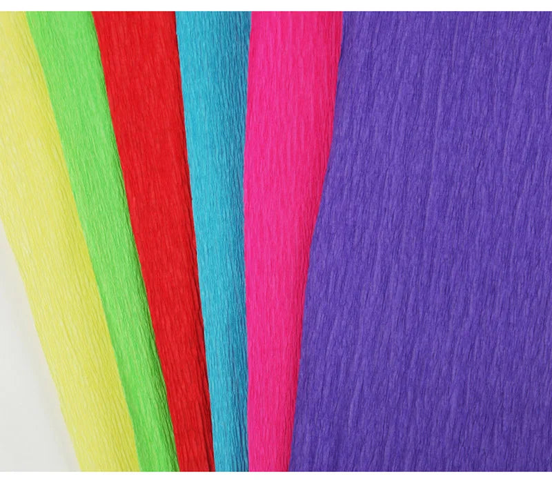 A vertical display of colorful crepe paper rolls in shades of green, red, cyan, pink, and purple.