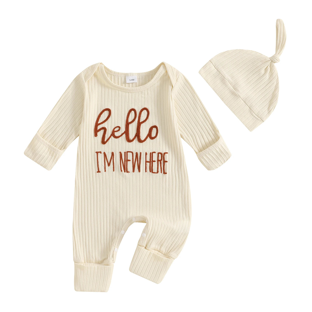 A cream-colored baby boy long sleeve ribbed romper and matching hat.
