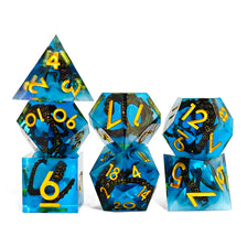 A set of blue and black resin dice shaped like an octopus for tabletop role-playing games