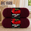 A pair of deep red Knitnex super soft acrylic yarn skeins for knitting and crochet.