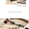 A collection of film strips and photographic paper samples are displayed on a light background.