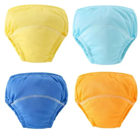 Quatre sous-vêtements d'entraînement en carton réutilisables de couleur jaune, bleu clair, bleu royal et orange.