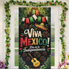 A vertical door cover featuring a vibrant design with Mexican flag elements, greenery, and a guitar, celebrating Mexico's Ind