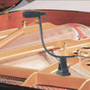 A clip-on condenser microphone with a gooseneck is positioned above a wooden acoustic instrument.