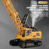 A yellow remote control spray crane truck model is shown in a close-up, simulating a construction environment.