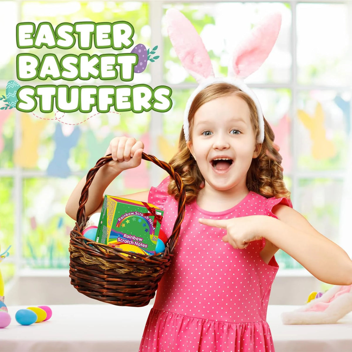 A smiling girl holds a woven basket filled with Easter basket stuffers and points to the side.