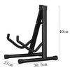 Black foldable metal guitar stand with adjustable arms and a vertical support column.