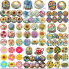 A collection of colorful floral diamond painting coasters in various patterns and colors with metal holders.