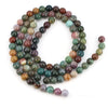 A strand of round loose natural India agate beads in various shades of green, brown, and purple stones.